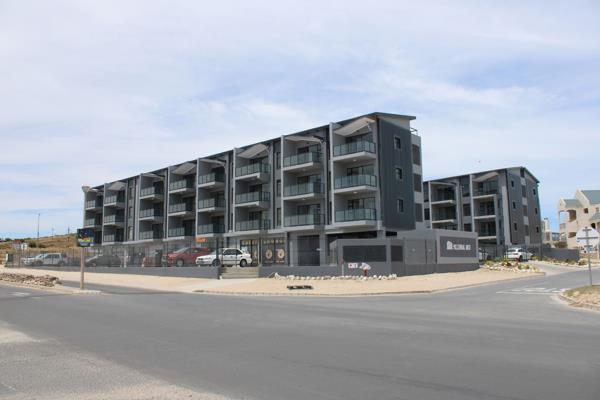 Introducing a modern, brand-new 2-bedroom flat on the first floor in Millennial Arch, Langebaan. This inviting residence features a ...