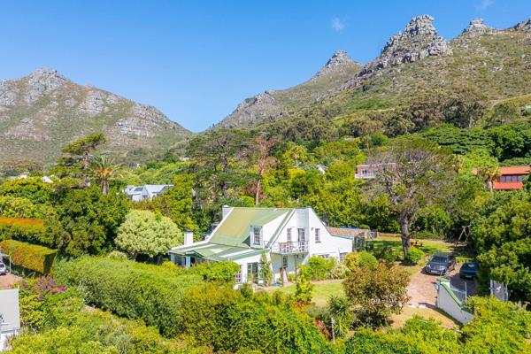 Nestled in a peaceful, tranquil setting with the soothing sounds of birdsong, this north-facing property welcomes all-day sunshine, capturing the warmth of winter’s last rays, and boasts breathtaking mountain views.

At the heart of this home is the expansive, covered patio—a ...