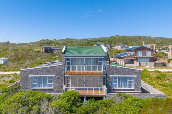 Experience coastal living in this Suiderstrand home which offers breathtaking sea views ...