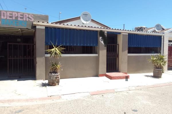 A TWO bedroom Charming Home with Approved Plans for sale in Makhaza Khayelitsha 

This lovely property features 2 cozy bedrooms, a ...