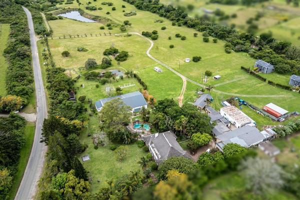 Grand old home steeped in history, built in the 1800&#39;s with sandstone exterior and thatched roof, on a 37306m2 site on the banks of ...