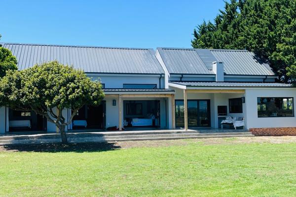 Escape to Silverstream House, a serene riverfront getaway situated within the exclusive ...