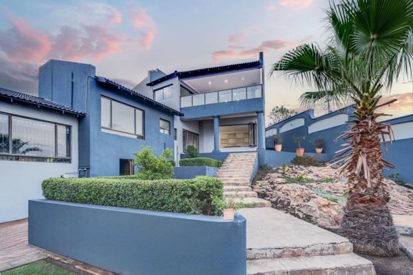 Experience elevated living in this exquisite multi-level property perched on Northcliff Hill, offering breathtaking panoramic views of ...