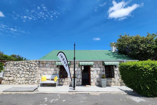 This commercial property boasts an outstanding location in the heart of Gansbaai&#39;s ...