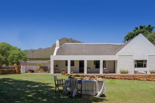 This is a rare opportunity to invest in timeless tranquility and purchase a listed heritage farm within the gorgeous Banghoek Private ...