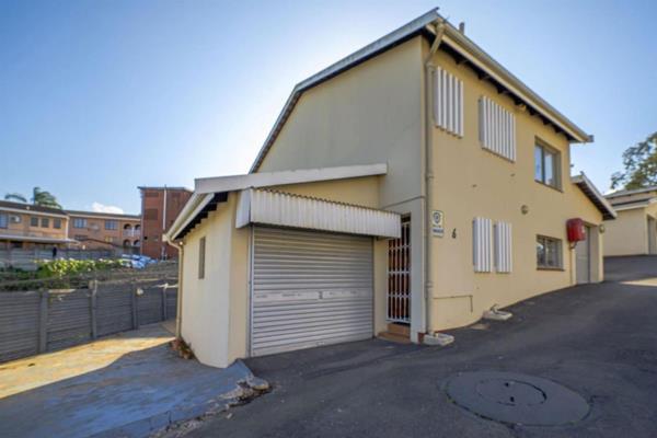 Welcome to your dream home! This spacious and secure 3-bedroom townhouse in Kenville, north of Durban, offers modern living with ...