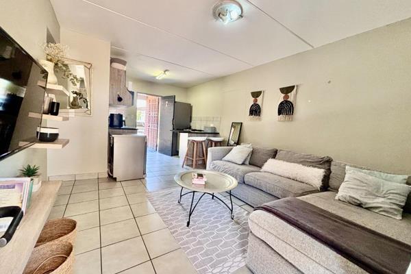 Experience the charm of this modern open-plan kitchen that effortlessly flows into the inviting lounge, perfect for entertaining. Step ...