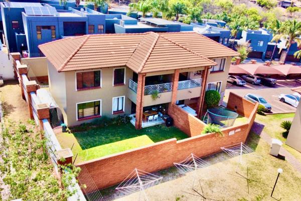 Modern upstairs two bedroom townhouse | communal swimming pool and clubhouse | cat ...