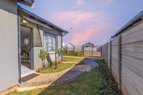 Enclosed by a sturdy perimeter wall, the property ensures privacy and peace of mind. The interior boasts a sleek, modern kitchen ...