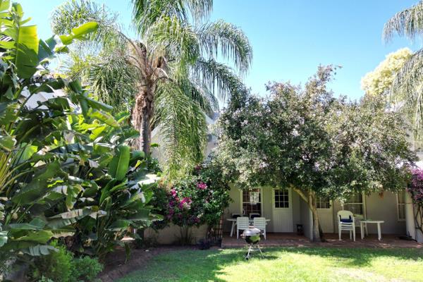 Discover easy living in this charming, well-maintained 3-bedroom, 2-bathroom home ...