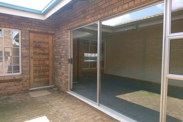 2 Bedrooms, 2 Bathrooms, Kitchen, Lounge, Private court yard with braai area, Remote access Tandem Garage.