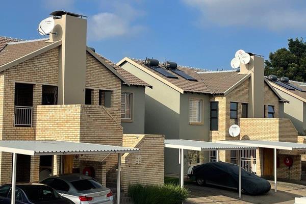 Welcome to your new home in Tugela Manor! This spacious first-floor townhouse offers ...