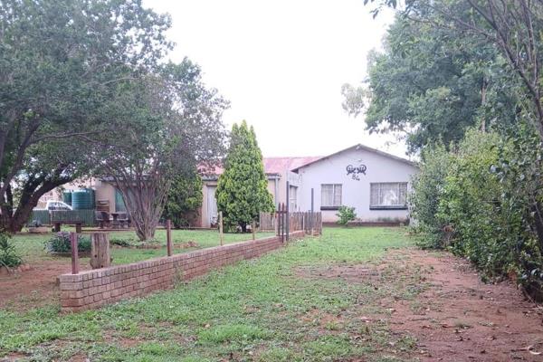 This property is a spacious 2.14-hectare plot featuring a main house and a flatlet with separate entry, offering both privacy and ...