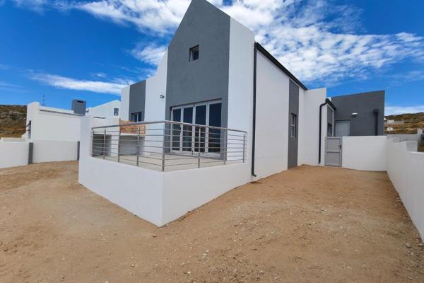 Brand New Home in Saldanha

Welcome to your dream home in the picturesque town of Saldanha. This brand-new property offers a blend of ...