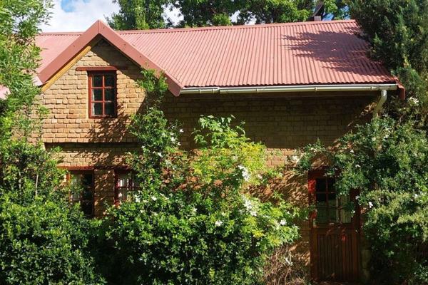 This is a barn that was converted into a quaint cottage with a bedroom on a mezzanine ...