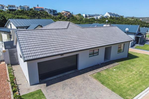 Nestled in a tranquil ravine location in Stilbaai Wes, this modern 3-bedroom home offers a serene retreat with all the comforts of ...