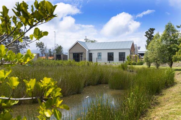 Tucked in the corner and overlooking the green belt and dam area, this home was designed for comfortable living and entertainment.  ...