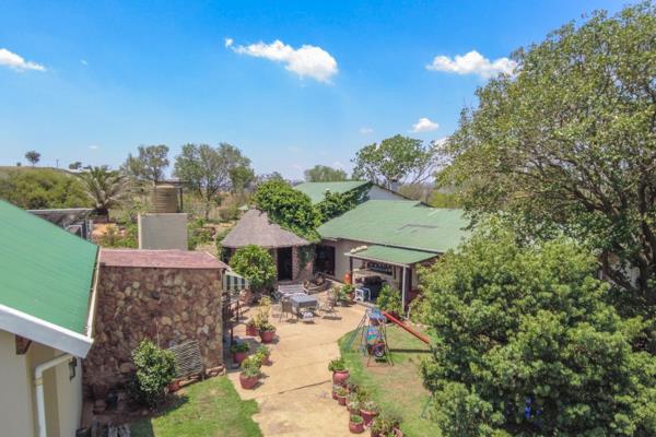 Your haven is a 14 hectare off-grid farm that offers a 3 bedroom main house and a 2 bedroom cottage; a very large garage with workshop ...