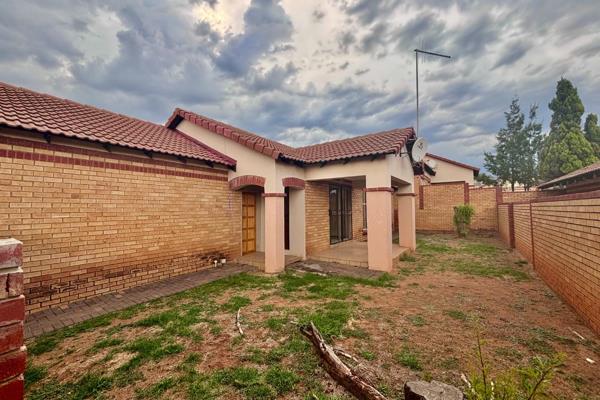 Discover this stunning face brick house located in a secure estate, designed for modern living. 
The open-plan kitchen flows ...