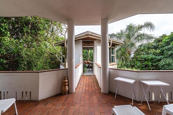 Located in a quiet cul-de-sac and surrounded by palm trees and luscious plants, this much loved architect-designed one-owner 4 bedroom ...