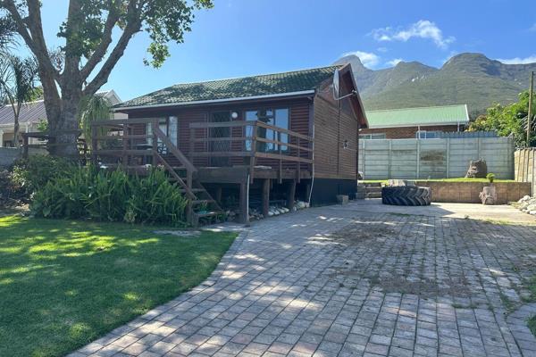 Exclusive sole mandate!!

Nestled in a serene corner with stunning mountain views, this cozy wooden retreat offers a perfect blend of ...