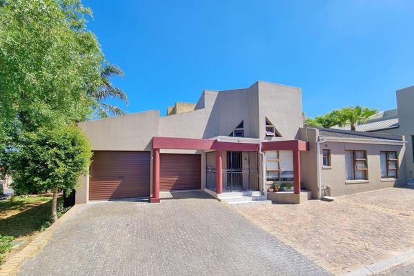 3-bedroom home with 2 bathrooms, a double garage, and a cozy open-plan layout featuring an indoor braai and a versatile loft for a ...