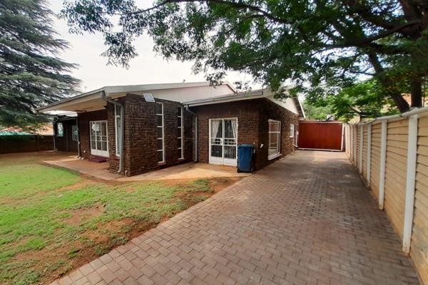 This spacious and low-maintenance four-bedroom face brick family home offers everything you need for comfortable living, including a ...