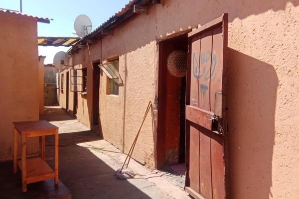 Four room house for sale in Emoyeni,Tembisa  with big yard ideal for investors and you can also make it into a beautiful home, it is ...