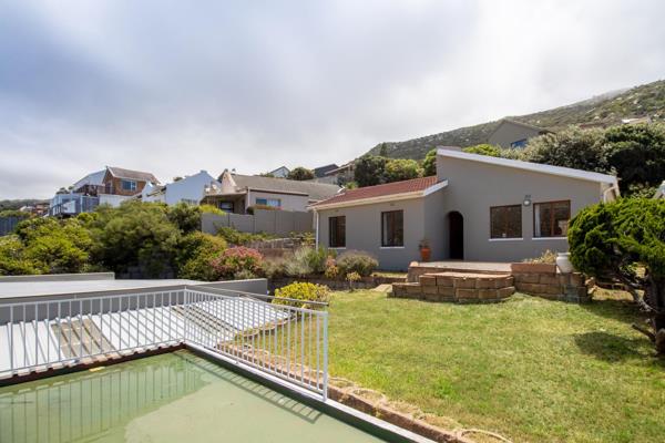 Nestled in the mountainside of Glencairn Heights, this exquisite property has the ...