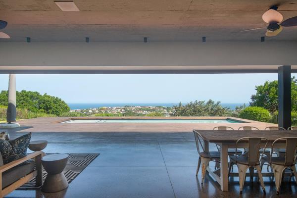 This rare gem in Brettenwood offers expansive sea views and is truly an entertainer&#39;s dream.

The modern architecture of this meticulously designed home provides large, open spaces, ideal for both relaxed living and lavish ...