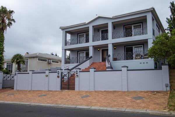 Property Features:

•	Impressive Dual Living Layout – Ideal for extended families or multi-generational living, with private ...