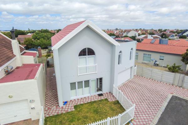 Set behind a classic white picket fence, this delightful home offers a tranquil retreat ...