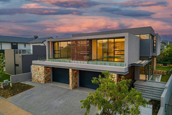 Exclusive mandate. This stunning 5-bedroom, 4.5-bathroom home epitomises contemporary ...