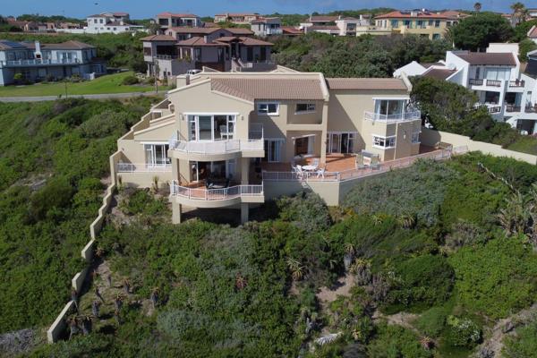 Perched dramatically on the oceanfront.
This four-bedroomed, three-bathrooms oceanfront ...