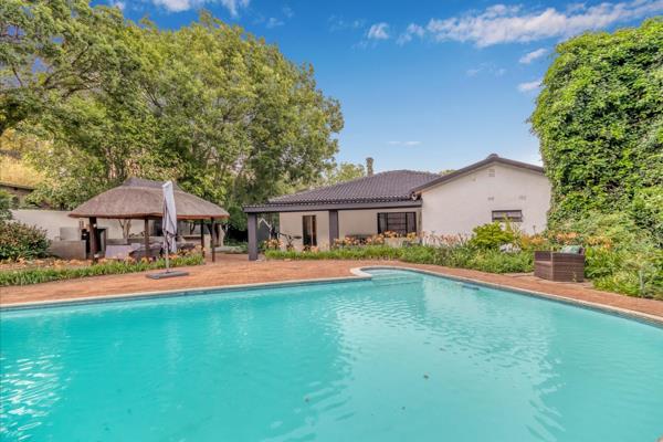 Nestled in the serene suburb of Craighall Park, 53 Lancaster Avenue offers a unique ...