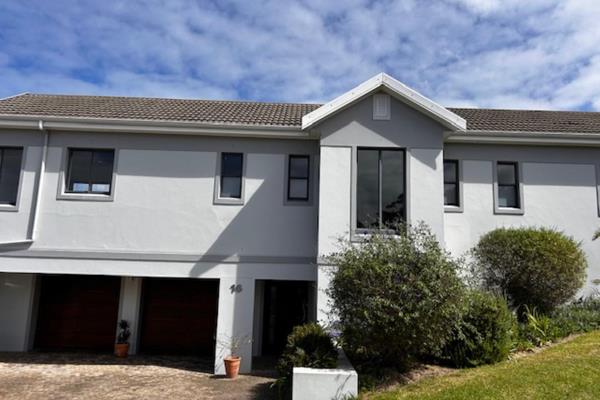 Large Braai Patio leading to spacious open plan living with expansive sea views and ...