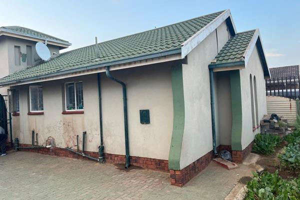 3 Bedroom house that offers 2 bathrooms - bathroom is separate from the toilet. Floors and ceilings are well done. Dining room and ...