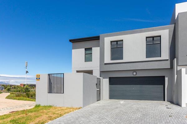 Welcome to this brand new, contemporary family home located in the sought-after neighborhood of Sandown, Cape Town. Designed with ...