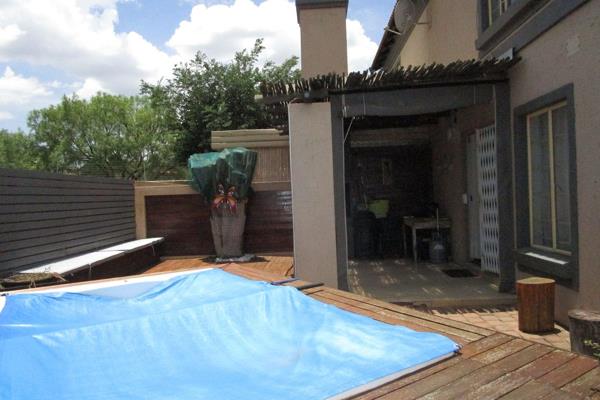 Beautiful 2 bedroom duplex for you to just move in and stay, with guest toilet, a jacuzzi  to relax and a build-in braai and a wooden ...