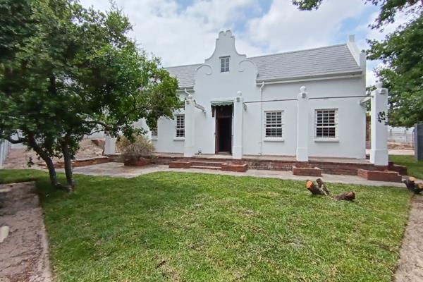 Step into the charm of a beautifully renovated old farmhouse, perfectly blended with sleek modern touches. This spacious home ...