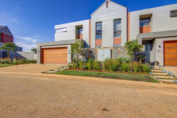 Discover contemporary luxury living in this stunning duet home, perfectly situated in ...