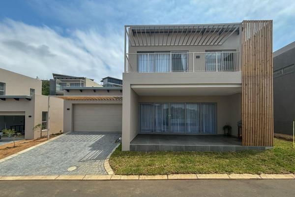 This newly built modern house offers  three bedrooms, two and a half bathrooms, with the main-ensuit on the upper level. 

Lower level ...