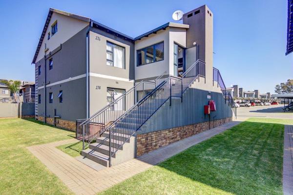 Experience stylish and energy-efficient living in this well-appointed first-floor townhouse:

Tiled Entrance Hall: Elegant and easy ...