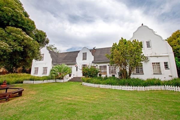 Nestled in the secure and sought after Guinea Fowl Estate is the most charming home! 
Boasting... 
-seven bedrooms
-seven and a half ...