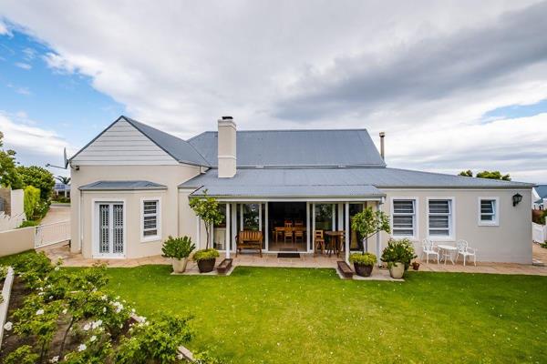 Proud Exclusive Mandate. Discover the pinnacle of coastal living with this timeless English-style home in the prestigious Hemel en Aarde Security Estate. Offering captivating sea and mountain views, this residence combines classic sophistication with contemporary comfort ...