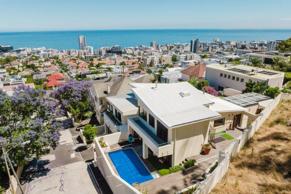 Situated on an elevated stand against the mountain, the home boasts commanding views of Lion’s Head, the surrounding mountains, and the ...