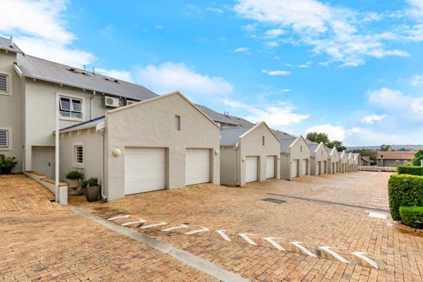 A modern masterpiece - this is sure to catch your eye!

An inviting entrance flows onto a delightful open plan lounge and dining area ...