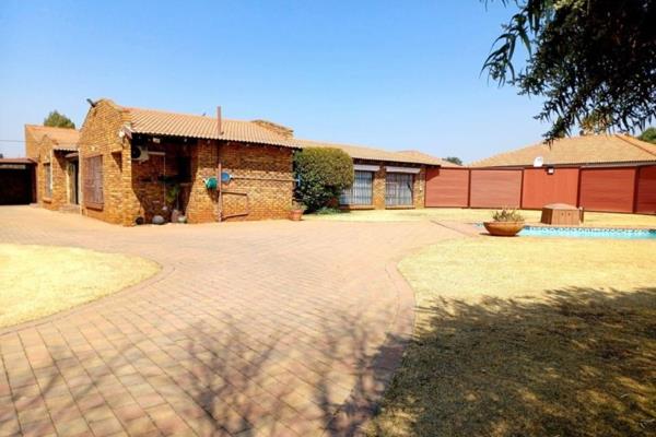 Welcome to your new home! Nestled in the New State Areas neighborhood, this face-brick home on a corner stand is the ideal residence ...