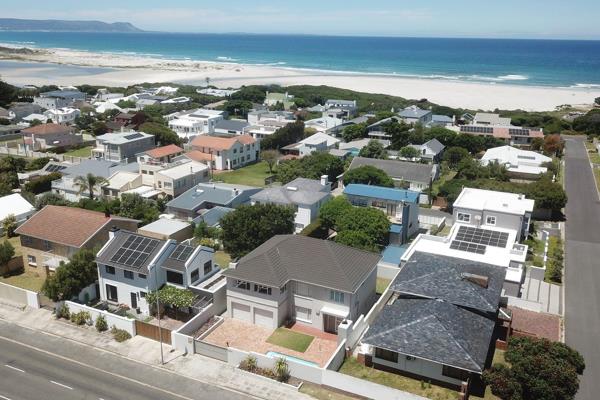 Sole Mandate - Discover the perfect coastal retreat in the sought-after Voelklip suburb ...