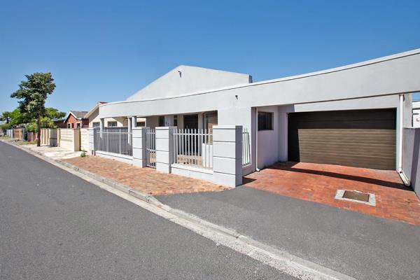 Step into this lovely home and be welcomed by a bright and airy open-plan lounge, seamlessly flowing into a modern kitchen. The kitchen ...